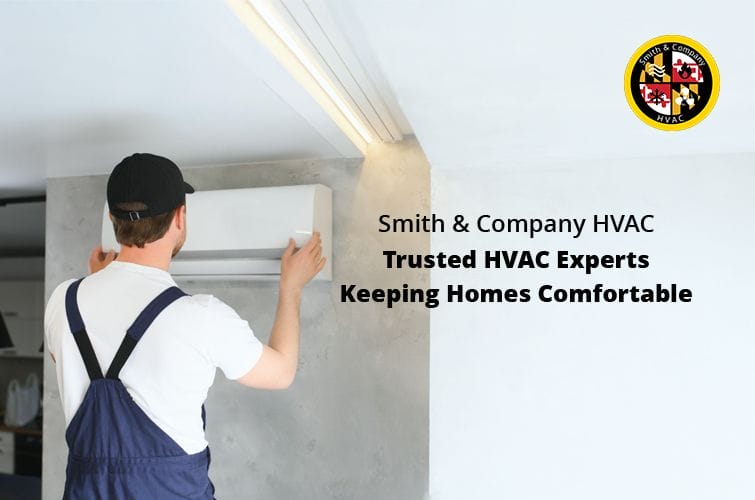 Smith & Company HVAC technician servicing a heating system.